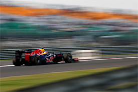 Sebastian Vettel leads all-Red Bull front row