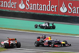 Vettel champion as Button wins Brazilian Grand Prix