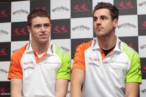 Formula One racing drivers Adrian Sutil and Paul di Resta pose for a photograph during a news conference to announce the Force India F1 drivers in Glasgow