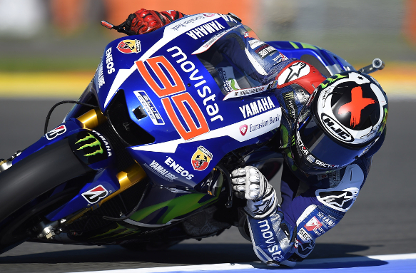 MotoGP finale: Lorenzo on pole as Rossi crashes out