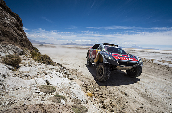 Two punctures and jamming throttle for Loeb sees Dakar lead swing to Peterhansel