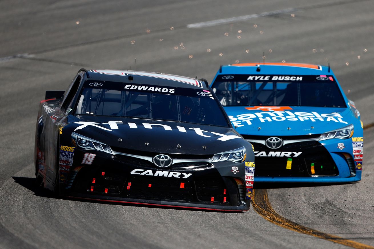 Carl Edwards knocks Kyle Busch out of the way to win at Richmond