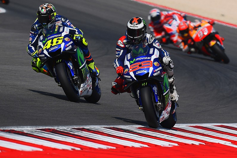 Rossi and Lorenzo clash at Misano as Pedrosa swoops by for MotoGP win